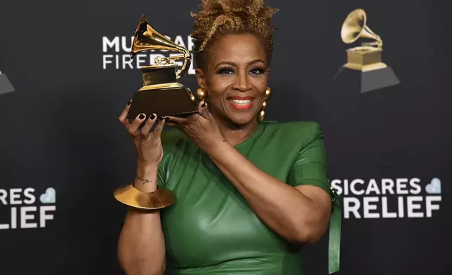 Avery*Sunshine poses in the press room with the award for best progressive R&amp;B album for "So Glad to Know You" during the 67th annual Grammy Awards on Sunday, Feb. 2, 2025, in Los Angeles. (Photo by Richard Shotwell/Invision/AP)