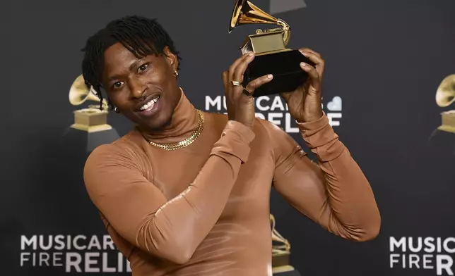 Lucky Daye poses in the press room with the award for best traditional R&amp;B performance for "That's You" during the 67th annual Grammy Awards on Sunday, Feb. 2, 2025, in Los Angeles. (Photo by Richard Shotwell/Invision/AP)