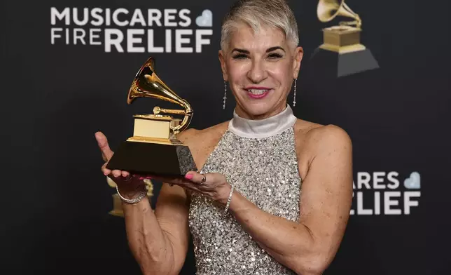 Elaine Martone poses in the press room with the award for producer of the year, classical during the 67th annual Grammy Awards on Sunday, Feb. 2, 2025, in Los Angeles. (Photo by Richard Shotwell/Invision/AP)