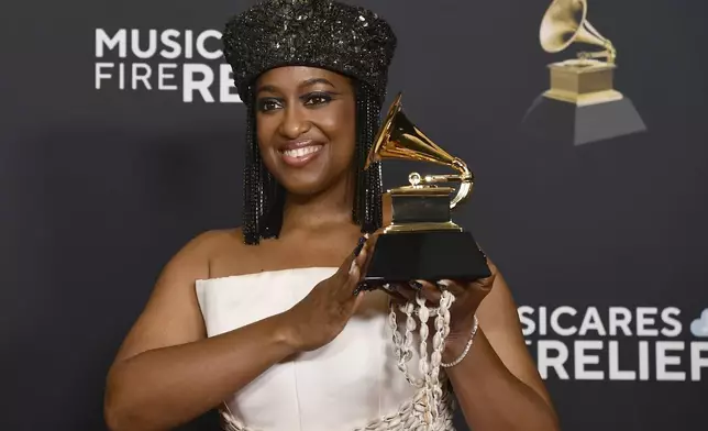 Rapsody poses in the press room with the award for best melodic rap performance for "3:AM," during the 67th annual Grammy Awards on Sunday, Feb. 2, 2025, in Los Angeles. (Photo by Richard Shotwell/Invision/AP)