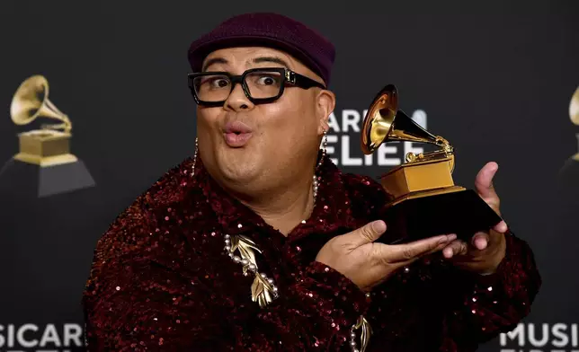 Kalani Pe'a poses in the press room with the award for best regional roots music album for "Kuini" during the 67th annual Grammy Awards on Sunday, Feb. 2, 2025, in Los Angeles. (Photo by Richard Shotwell/Invision/AP)