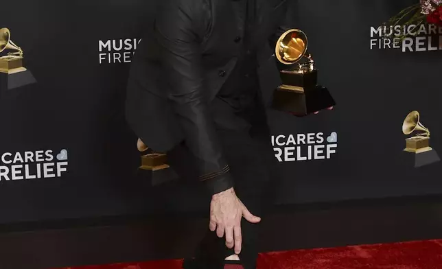 Taylor Eigsti, winner of the award for best contemporary instrumental album for "Plot Armor" poses in the press room during the 67th annual Grammy Awards on Sunday, Feb. 2, 2025, in Los Angeles. (Photo by Richard Shotwell/Invision/AP)