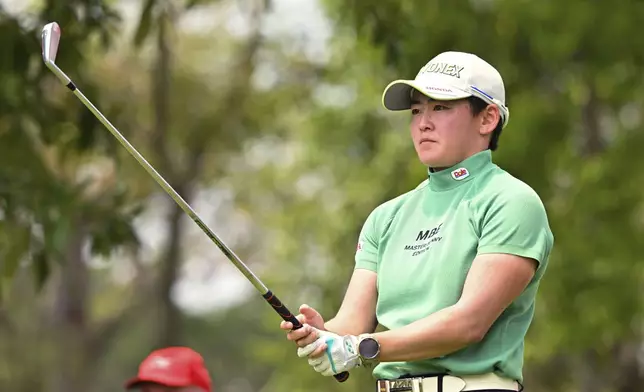 Akie Iwai of Japan prepares for her shot on the 16th hole during the first round of the LPGA Honda Thailand golf tournament in Pattaya, southern Thailand, Thursday, Feb. 20, 2025. (AP Photo/Kittinun Rodsupan)