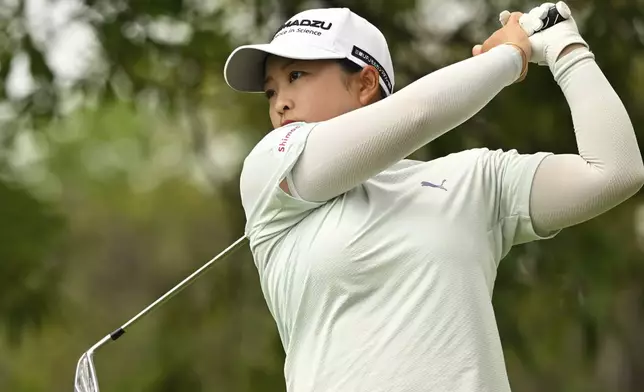 Mao Saigo of Japan hits a tee shot on the first hole of the LPGA Honda Thailand golf tournament in Pattaya, southern Thailand, Thursday, Feb. 20, 2025. (AP Photo/Kittinun Rodsupan)