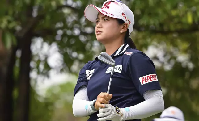 Hye-Jin Choi of South Korea watches her shot on the 16th hole during the first round of the LPGA Honda Thailand golf tournament in Pattaya, southern Thailand, Thursday, Feb. 20, 2025. (AP Photo/Kittinun Rodsupan)