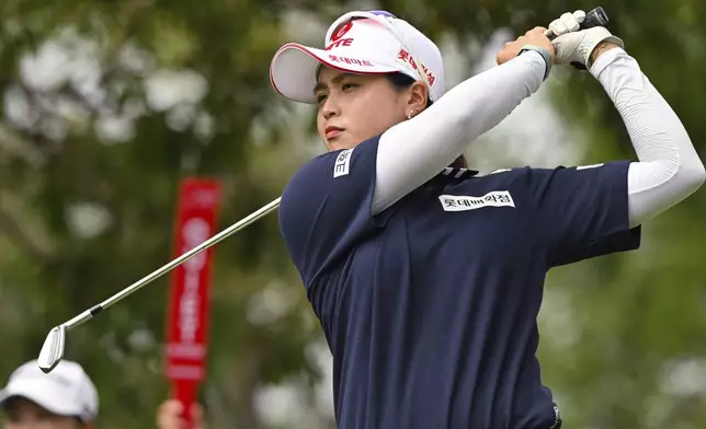 Hye-Jin Choi of South Korea watches her shot on the 16th hole during the first round of the LPGA Honda Thailand golf tournament in Pattaya, southern Thailand, Thursday, Feb. 20, 2025. (AP Photo/Kittinun Rodsupan)