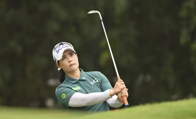 Moriya Jutanugarn of Thailand watches her shot on the 17th hole during the first round of the LPGA Honda Thailand golf tournament in Pattaya, southern Thailand, Thursday, Feb. 20, 2025. (AP Photo/Kittinun Rodsupan)