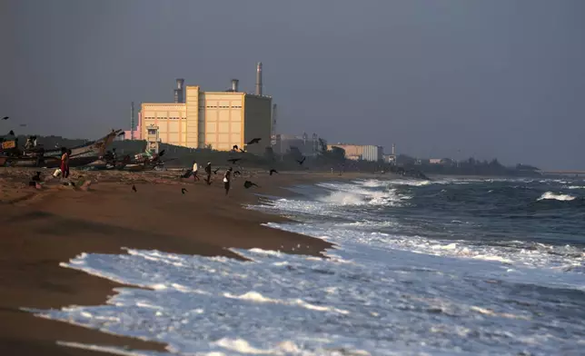 Fishermen park their boats on the shore near the Madras Atomic Power Station located at Kalpakkam, in the Indian state of Tamil Nadu, Monday, Feb. 10, 2025. (AP Photo/ R. Parthibhan)