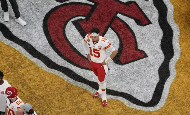 Kansas City Chiefs quarterback Patrick Mahomes (15) watches from the sideline after throwing an interception against the Philadelphia Eagles during the first half of the NFL Super Bowl 59 football game, Sunday, Feb. 9, 2025, in New Orleans. (AP Photo/David J. Phillip)