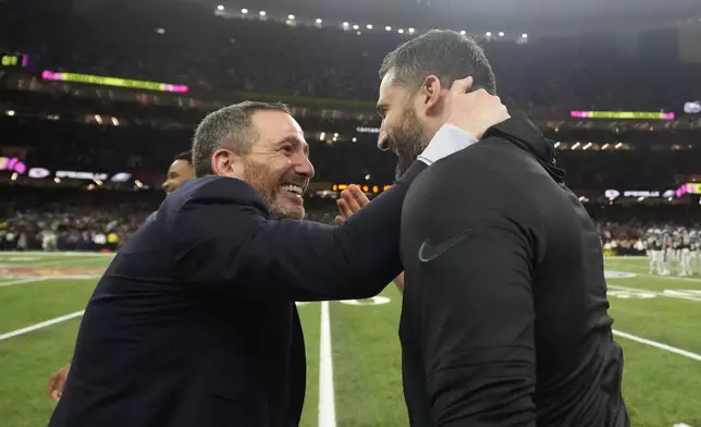 Philadelphia Eagles general manager Howie Roseman, left, celebrates with head coach Nick Sirianni during the second half of the NFL Super Bowl 59 football game against the Kansas City Chiefs, Sunday, Feb. 9, 2025, in New Orleans. (AP Photo/Brynn Anderson)