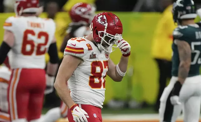 Kansas City Chiefs tight end Travis Kelce (87) walks off the field after the Philadelphia Eagles recovered a fumble by the Chiefs during the second half of the NFL Super Bowl 59 football game, Sunday, Feb. 9, 2025, in New Orleans. (AP Photo/Stephanie Scarbrough)