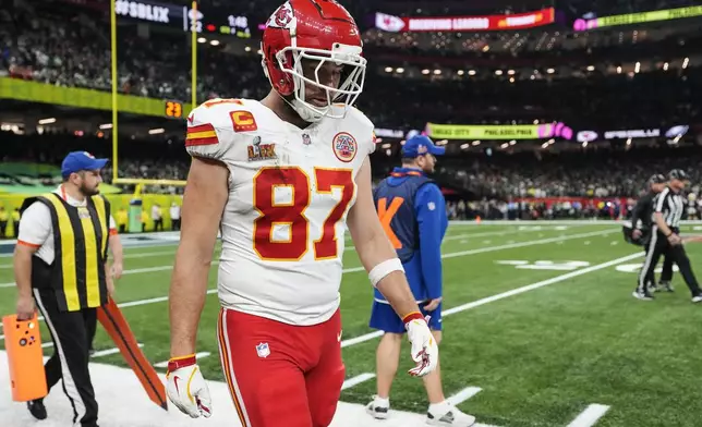 Kansas City Chiefs tight end Travis Kelce (87) walks to the bench during the second half of the NFL Super Bowl 59 football game against the Philadelphia Eagles, Sunday, Feb. 9, 2025, in New Orleans. (AP Photo/Ashley Landis)