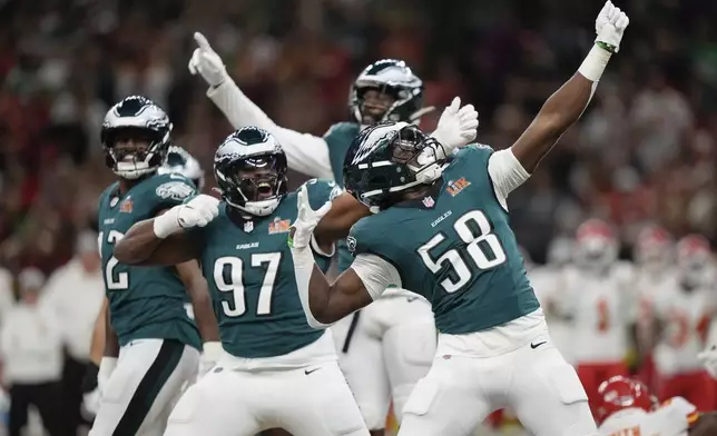 Philadelphia Eagles linebacker Jalyx Hunt (58) celebrates after sacking Kansas City Chiefs quarterback Patrick Mahomes during the first half of the NFL Super Bowl 59 football game, Sunday, Feb. 9, 2025, in New Orleans. (AP Photo/Matt Slocum)