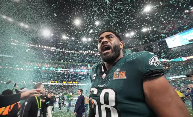 Philadelphia Eagles tackle Jordan Mailata celebrates after defeating the Kansas City Chiefs in the NFL Super Bowl 59 football game, Sunday, Feb. 9, 2025, in New Orleans. (AP Photo/Doug Benc)