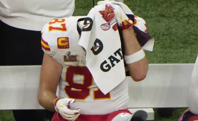 Kansas City Chiefs tight end Travis Kelce (87) sits on the bench during the second half of the NFL Super Bowl 59 football game against the Philadelphia Eagles, Sunday, Feb. 9, 2025, in New Orleans. (AP Photo/Charlie Riedel)