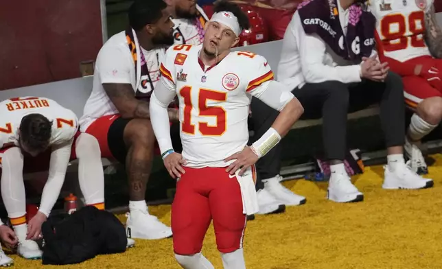 Kansas City Chiefs quarterback Patrick Mahomes (15) stands on the sidelines during the second half of the NFL Super Bowl 59 football game against the Philadelphia Eagles, Sunday, Feb. 9, 2025, in New Orleans. (AP Photo/Gerald Herbert)