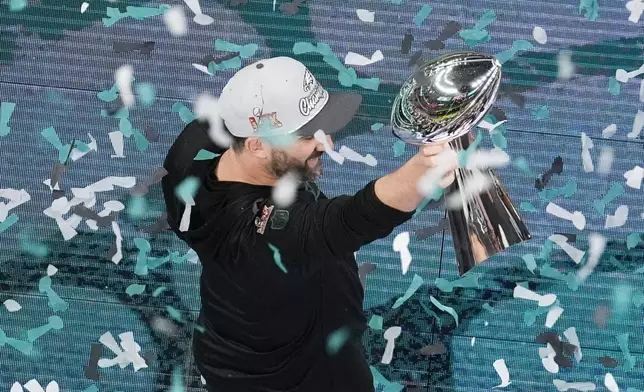 Philadelphia Eagles head coach Nick Sirianni holds the Vince Lombardi Trophy after the Eagles won the NFL Super Bowl 59 football game against the Kansas City Chiefs, Sunday, Feb. 9, 2025, in New Orleans. (AP Photo/David J. Phillip)