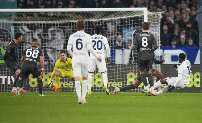Lazio's Boulaye Dia, right, scores his side's 2nd goal during a Serie A soccer match between Lazio and Napoli in Rome, Italy, Saturday, Feb. 15, 2025. (AP Photo/Andrew Medichini)