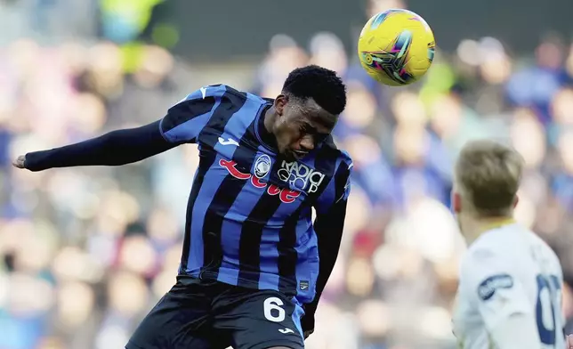 Atalanta's Ibrahim Sulemana goes for a header during the Italian Serie A soccer match between Atalanta and Cagliari at the Gewiss Stadium in Bergamo, North Italy - , Saturday, Feb. 15, 2025. (Spada/LaPresse via AP)