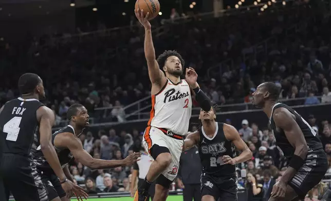 Detroit Pistons guard Cade Cunningham (2) drives to the basket against the San Antonio Spurs during the first half of an NBA basketball game in Austin, Texas, Friday, Feb. 21, 2025. (AP Photo/Eric Gay)