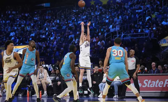 Los Angeles Lakers forward Dalton Knecht shoots during the NBA All-Star basketball game Sunday, Feb. 16, 2025, in San Francisco. (AP Photo/Godofredo A. Vásquez)