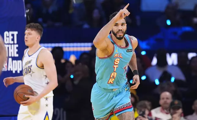 Boston Celtics guard Jayson Tatum reacts after scoring during the NBA All-Star basketball game Sunday, Feb. 16, 2025, in San Francisco. (AP Photo/Godofredo A. Vásquez)