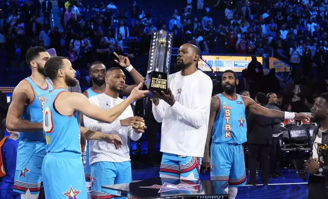 Members of Shaq's OGs celebrates after winning the NBA All-Star basketball game Sunday, Feb. 16, 2025, in San Francisco. (AP Photo/Godofredo A. Vásquez)