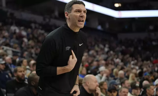 Oklahoma City Thunder head coach Mark Daigneault yells toward a referee during the first half of an NBA basketball game against the Minnesota Timberwolves, Thursday, Feb. 13, 2025, in Minneapolis. (AP Photo/Abbie Parr)