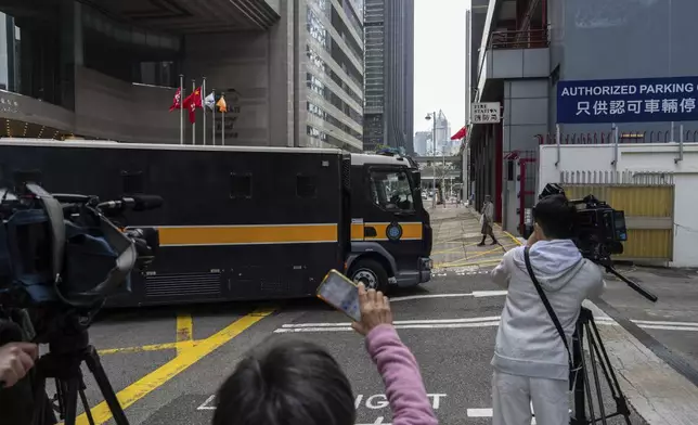 A Correctional Services prison van arrives at the District Court ahead of the sentencing on a riot case involving a former pro-democracy lawmaker Lam Cheuk-ting in Wan Chai, Hong Kong on Thursday, Feb. 27, 2025. (AP Photo/Chan Long Hei)
