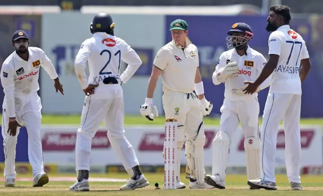 Sri Lanka's Prabath Jayasuriya, right, and others appeal for the wicket of Australia's Steven Smith during day two of the second test cricket match between Sri Lanka and Australia in Galle , Sri Lanka, Friday, Feb. 7, 2025. (AP Photo/Eranga Jayawardena)