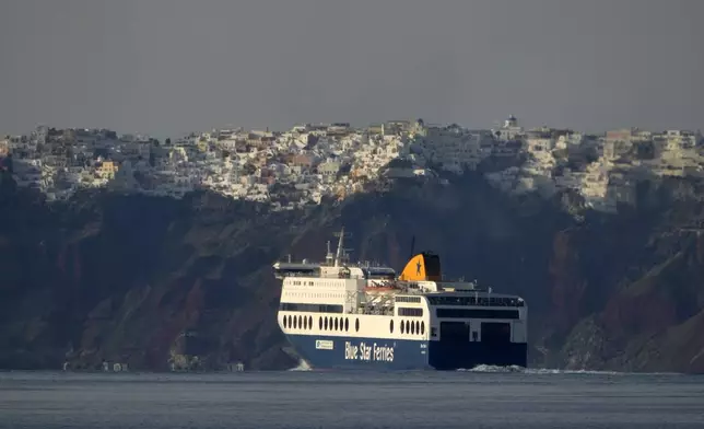 A regularly scheduled ferry departs from Santorini to Athens' port of Piraeus, after a spike in seismic activity raised concerns about a potentially powerful earthquake in Santorini, southern Greece, Monday, Feb. 3, 2025. (AP Photo/Petros Giannakouris)