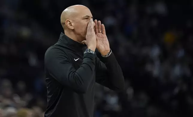 Sacramento Kings head coach Doug Christie yells during the first half of an NBA basketball game against the Minnesota Timberwolves, Monday, Feb. 3, 2025, in Minneapolis. (AP Photo/Abbie Parr)