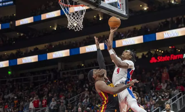Detroit Pistons forward Ausar Thompson attempts a basket during the second half of an NBA basketball game against the Atlanta Hawks, Sunday, Feb. 23, 2025, in Atlanta. (AP Photo/Erik Rank)