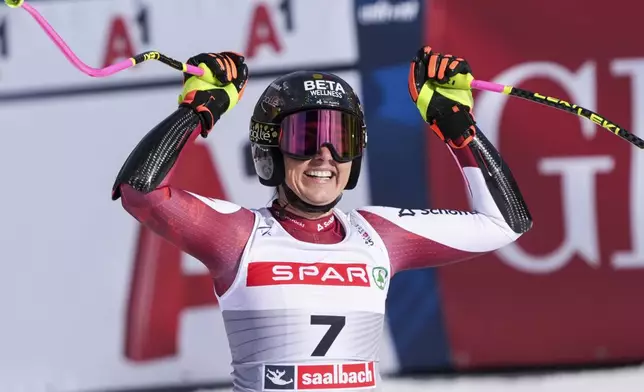 Austria's Stephanie Venier celebrates at the finish area of a women's Super-G, at the Alpine Ski World Championships, in Saalbach-Hinterglemm, Austria, Thursday, Feb. 6, 2025. (AP Photo/Giovanni Auletta)