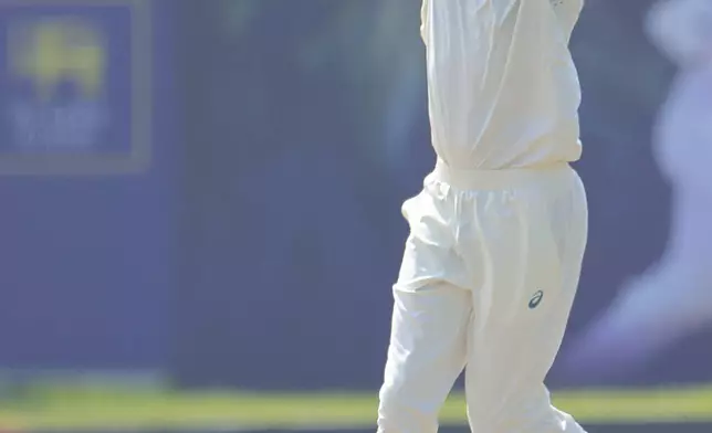 Australia's Matthew Kuhnemann bowls a delivery during the second test cricket match between Sri Lanka and Australia in Galle , Sri Lanka, Thursday, Feb. 6, 2025. (AP Photo/Lahiru Harshana)