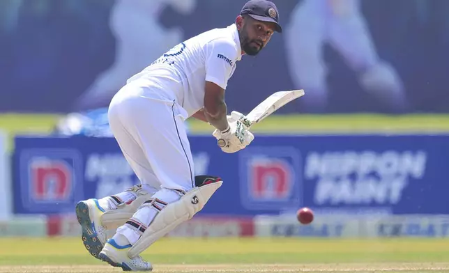 Sri Lanka's Dimuth Karunaratne plays a shot during the second test cricket match between Sri Lanka and Australia in Galle , Sri Lanka, Thursday, Feb. 6, 2025. (AP Photo/Lahiru Harshana)