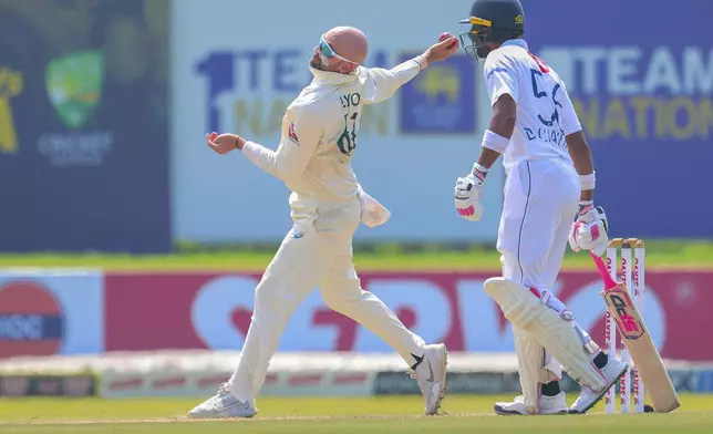 Australia's Nathan Lyon bowls a delivery during the second test cricket match between Sri Lanka and Australia in Galle , Sri Lanka, Thursday, Feb. 6, 2025. (AP Photo/Lahiru Harshana)