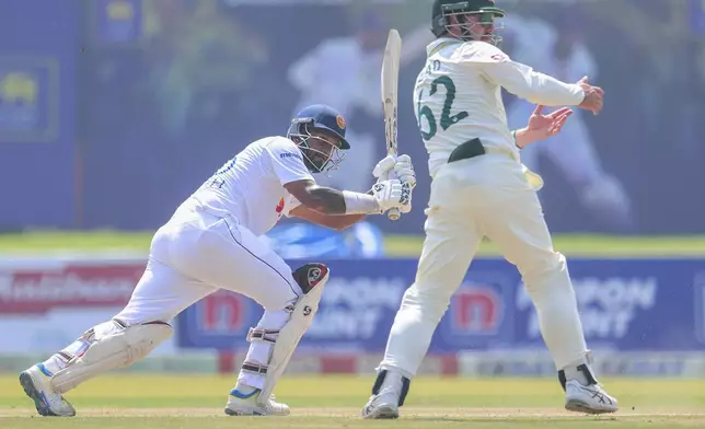 Sri Lanka's Dimuth Karunaratne plays a shot during the second test cricket match between Sri Lanka and Australia in Galle , Sri Lanka, Thursday, Feb. 6, 2025. (AP Photo/Lahiru Harshana)