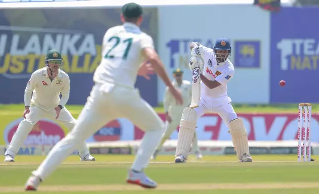 Sri Lanka's Dimuth Karunaratne plays a shot during the second test cricket match between Sri Lanka and Australia in Galle , Sri Lanka, Thursday, Feb. 6, 2025. (AP Photo/Lahiru Harshana)