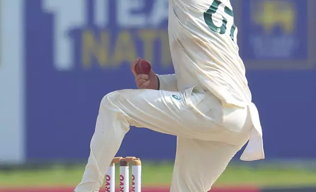 Australia's Nathan Lyon bowls a delivery during the first day of the second test cricket match between Sri Lanka and Australia in Galle, Sri Lanka, Thursday, Feb. 6, 2025. (AP Photo/Lahiru Harshana)