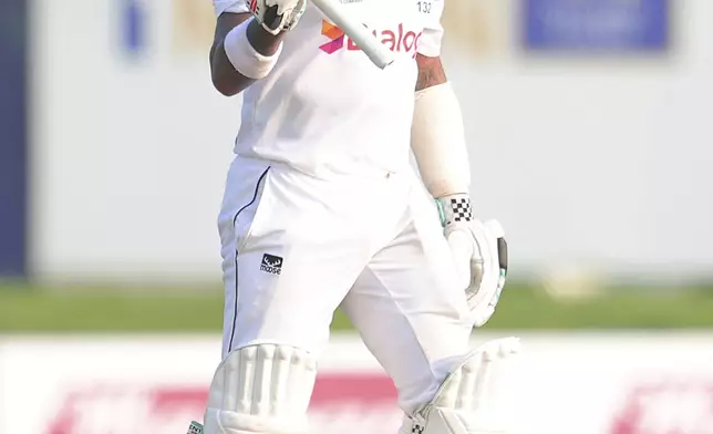 Sri Lanka's Kusal Mendis celebrates his fifty runs during the first day of the second test cricket match between Sri Lanka and Australia in Galle, Sri Lanka, Thursday, Feb. 6, 2025. (AP Photo/Lahiru Harshana)