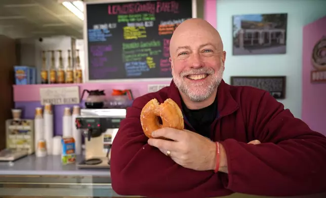 FILE - Owner Sean Young poses at Leavitt's Country Bakery, in this April 13, 2023 file photo, in Conway, N.H. (AP Photo/Robert F. Bukaty, file)