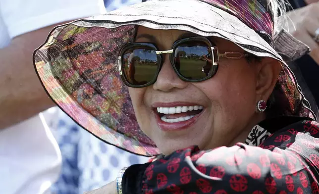 FILE - Kultida Woods, Tiger Woods' mother, watches as her son plays on the third hole during the third round of the Honda Classic golf tournament, Saturday, Feb. 24, 2018 in Palm Beach Gardens, Fla. (AP Photo/Wilfredo Lee, File)
