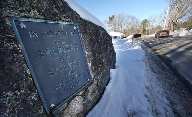A roadside plaque honors soldiers and sailors in Nobleboro, Maine, Tuesday, Feb. 11, 2025, in Nobleboro. (AP Photo/Robert F. Bukaty)