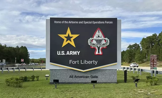 Vehicles pass a sign for Fort Liberty, an Army installation near Fayetteville, N.C., on Tuesday, Oct. 1, 2024. The name was changed from Fort Bragg in 2023, but Defense Secretary Pete Hegseth signed an order Monday, Feb. 10, 2024, changing it back, in honor of World War II veteran Roland L. Bragg of Maine. It was originally named for Confederate Gen. Braxton Bragg, a North Carolina native. (AP Photo/Allen G. Breed)