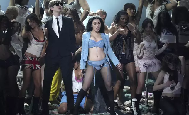 Charli XCX performs with The Dare during the 67th annual Grammy Awards on Sunday, Feb. 2, 2025, in Los Angeles. (AP Photo/Chris Pizzello)