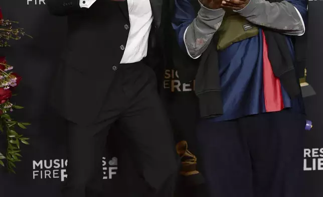 Anderson .Paak, left, and Knxwledge, winners of the best progressive R&amp;B album for "Why Lawd?", pose in the press room during the 67th annual Grammy Awards on Sunday, Feb. 2, 2025, in Los Angeles. (Photo by Richard Shotwell/Invision/AP)