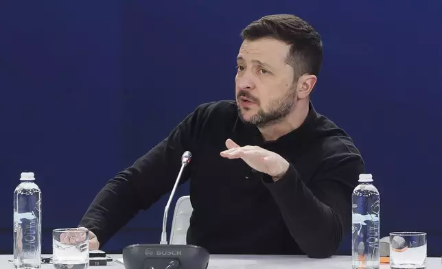 Ukrainian President Volodymyr Zelenskiy attends a press conference after the "Support Ukraine" summit, marking the third anniversary of the Russian invasion, in Kyiv, Ukraine, Feb. 24, 2025. (Gleb Garanich/Pool Photo via AP)