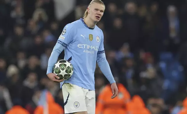 Manchester City's Erling Haaland reacts after the Champions League playoff first leg soccer match between Manchester City and Real Madrid at the Etihad Stadium in Manchester, England, Tuesday, Feb. 11, 2025. (AP Photo/Darren Staples)