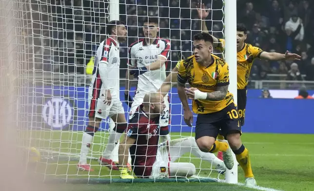 Inter Milan's Lautaro Martinez celebrates after scoring his side's opening goal during a Serie A soccer match between Inter Milan and Genoa, at the San Siro stadium in Milan, Italy, Saturday, Feb. 22, 2025. (AP Photo/Luca Bruno)